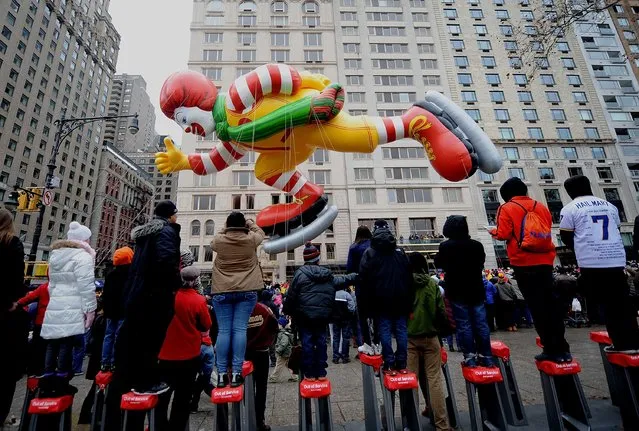 The Roanald McDonald Balloon is flown at the 88th Annual Macy's Thanksgiving Day on November 27, 2014 in New York City. (Photo by Brad Barket/Getty Images)