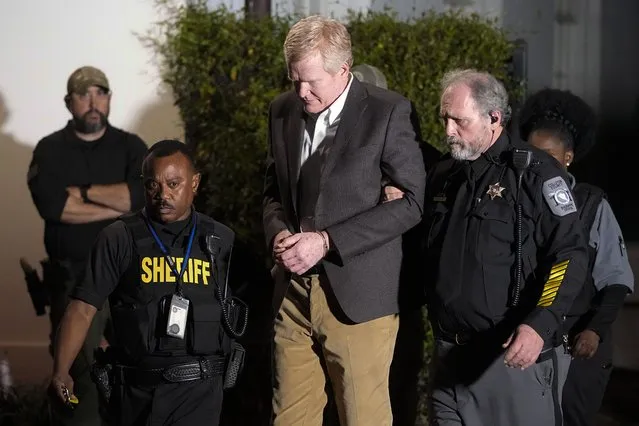 Alex Murdaugh is led outside the Colleton County Courthouse by sheriff's deputies after being convicted of two counts of murder Thursday, March 2, 2023, in Walterboro, S.C., in the June 7, 2021, shooting deaths of Murdaugh's wife and son. (Photo by Chris Carlson/AP Photo)