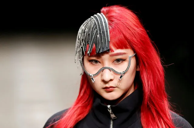 A model presents a creation by designer CHANU from his Autumn/Winter 2018 collection for his brand ACUOD by CHANU during Fashion Week Tokyo in Tokyo, Japan March 23, 2018. (Photo by Toru Hanai/Reuters)