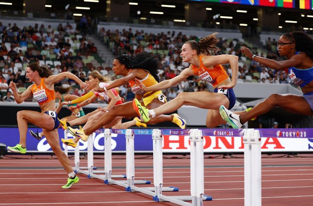 Competitors in the 100-metre hurdles event, part of the women’s heptathlon, at the World Athletics Championship in Tokyo, Japan on September 19, 2025. (Photo by Edgar Su/Reuters)