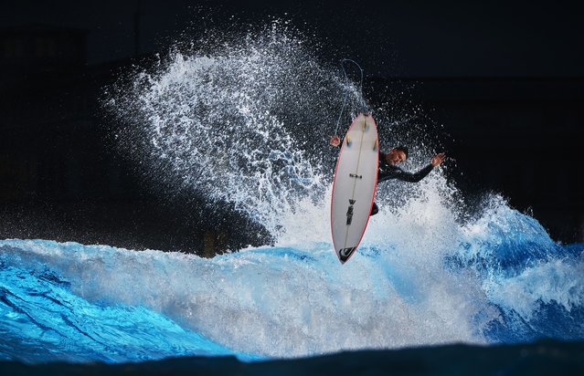 Marco Mignot of France performs an aerial during a private surf training session at 02 Surftown MUC on October 07, 2025 in Hallbergmoos, Germany. Seven surfers from France and French Polynesia traveled to Munich for some intensive surf training sessions at Surftown MUC. The wave pool can provide a variety of different waves from a point break or A frame to a fast hollow wave with air sections allowing for a huge variety of surfing conditions. (Photo by Adam Pretty/Getty Images)