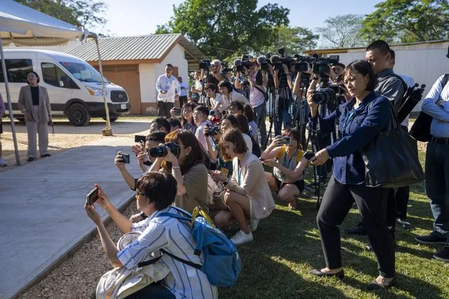 Taiwanese media waits for President Tsai Ing-wen after she inspecting a sheep and goat project supported by Taiwan Technical Mission in Cayo, Belize, Monday, April 3, 2023. Tsai is in Belize for an official three-day visit. (Photo by Moises Castillo/AP Photo)