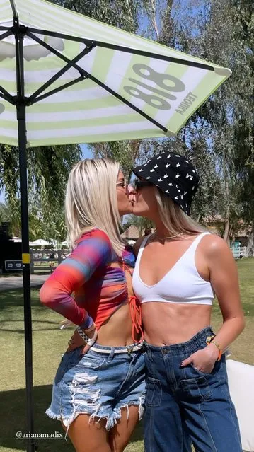 American TV personality Ariana Madix kisses pal Dayna Kathan during the CELSIUS Oasis House party in the second decade of April 2023. (Photo by @dadadayns/Instagram)