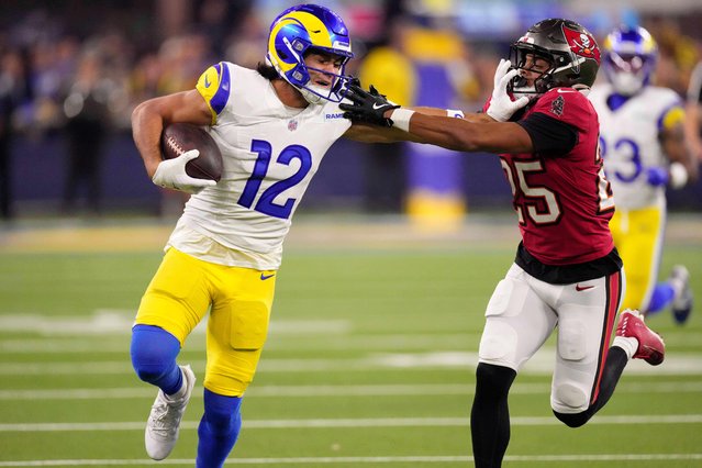 Los Angeles Rams wide receiver Puka Nacua (12) runs against Tampa Bay Buccaneers cornerback Jacob Parrish during the first half of an NFL football game, Sunday, November 23, 2025, in Inglewood, Calif. (Photo by Mark J. Terrill/AP Photo)
