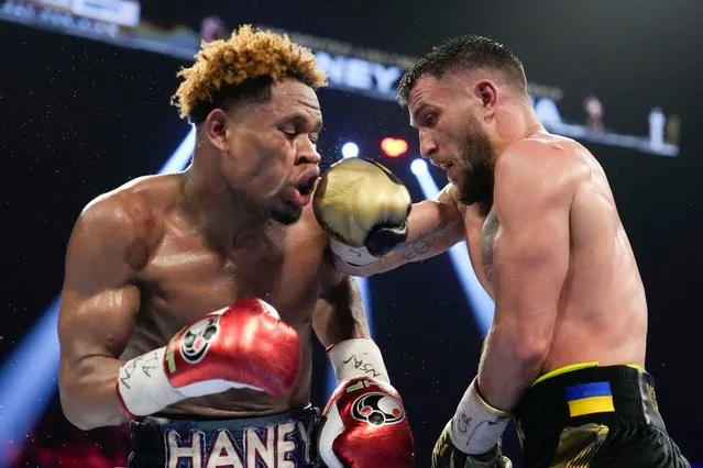 Devin Haney, left, fights Vasiliy Lomachenko in an undisputed lightweight championship boxing match Saturday, May 20, 2023, in Las Vegas. Haney won by unanimous decision. (Photo by John Locher/AP Photo)