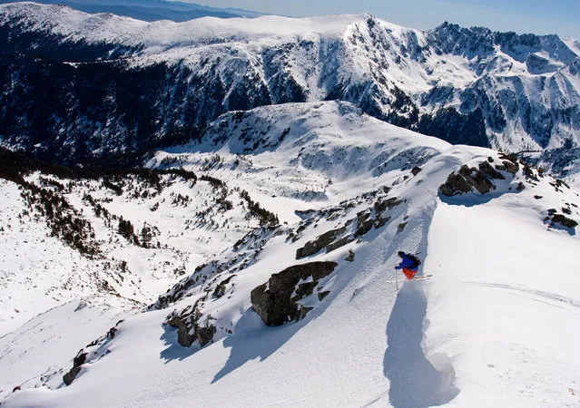 “Extreme skiing”. Back country skier dropping off a cornice in a winter day. Location: Pirin mountains, Bulgaria. (Photo and caption by Victor Troyanov/National Geographic Traveler Photo Contest)