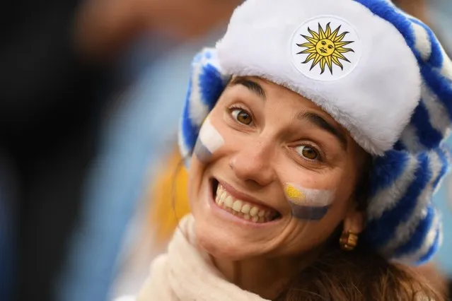 A Uruguay fan with a painted face is seen before kick off of the Russia 2018 World Cup Group A football match between Egypt and Uruguay at the Ekaterinburg Arena in Ekaterinburg, Russia on June 15, 2018. (Photo by Jorge Guerrero/AFP Photo)