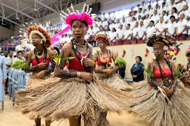Students in traditional dress welcome the Princess Royal on April 12, 2022 to Caritas Technical Secondary School, an all-girl boarding school for 700 students run by the Catholic Church in Port Moresby, on day two of the royal trip to Papua New Guinea on behalf of the Queen, in celebration of the Platinum Jubilee. (Photo by Kirsty O'Connor/PA Images via Getty Images)