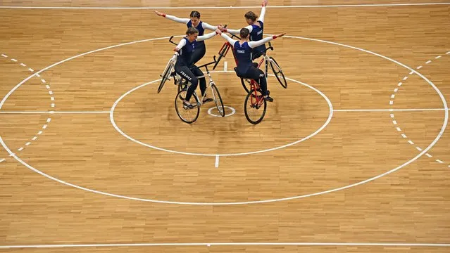The France team take part in the Open Elite Artistic Cycling ACT 4 final during the UCI Cycling World Championships in Glasgow, Scotland on August 13, 2023. (Photo by Paul Ellis/AFP Photo)