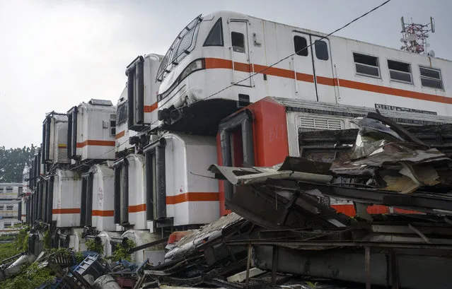 Parts of the trains have been removed, on February 27, 2015, in Purwakarta, Indonesia. (Photo by HKV/Barcroft Media)