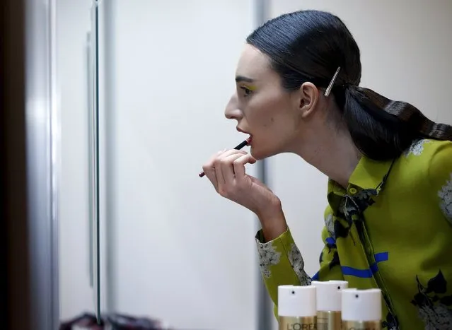A model gets ready backstage during the Mercedes-Benz Fashion Days in Tbilisi, Georgia, May 2, 2015. (Photo by David Mdzinarishvili/Reuters)