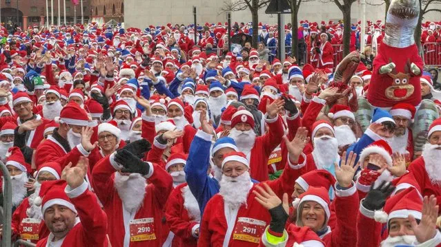 Participants taking part in the Liverpool Santa Dash in Liverpool in aid of Alder Hey Children's Hospital on Sunday, December 5, 2021. (Photo by Jason Roberts/PA Images via Getty Images)