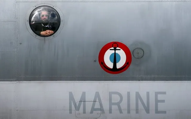 A French Navy crewman is seen by the window as a Breguet Atlantic taxies for a flying display, three days before the opening of the 53rd Paris Air Show at Le Bourget Airport near Paris, France on June 14, 2019. (Photo by Pascal Rossignol/Reuters)