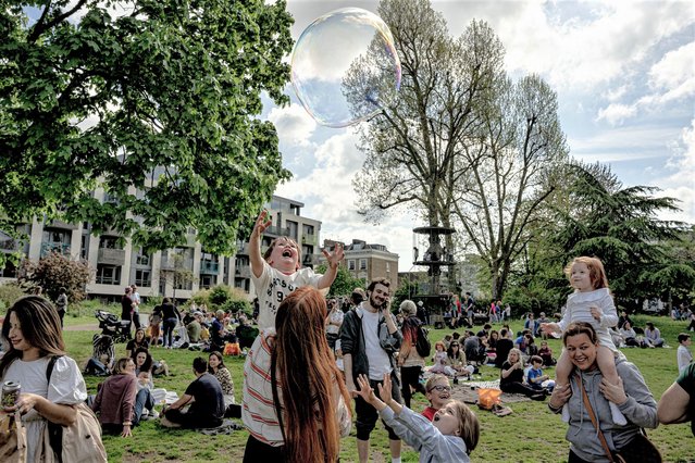 Scenes from Arundel Square street party in Islington in North London the day after the Coronation of King Charles III on May 7, 2023. The traditional Big Lunches as they are locally known take place during royal celebrations. (Photo by James Forde for The Washington Post)
