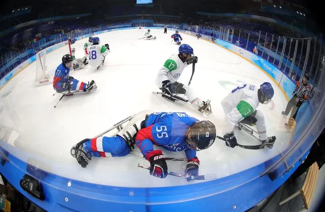 Jong Ho Jang of Team South Korea hits the sideboardsduring the Qualifying Final Para Ice Hockey game at National Indoor Stadium on day five of the Beijing 2022 Winter Paralympics at on March 09, 2022 in Beijing, China. (Photo by Carmen Mandato/Getty Images)