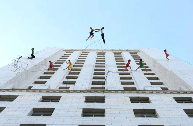 Bandaloop performs at the “La La Land Day” Celebration in Los Angeles City Hall on Tuesday, April 25, 2016, in Los Angeles. (Photo by Eric Charbonneau/Invision for Lionsgate Home Entertainment/AP Images)