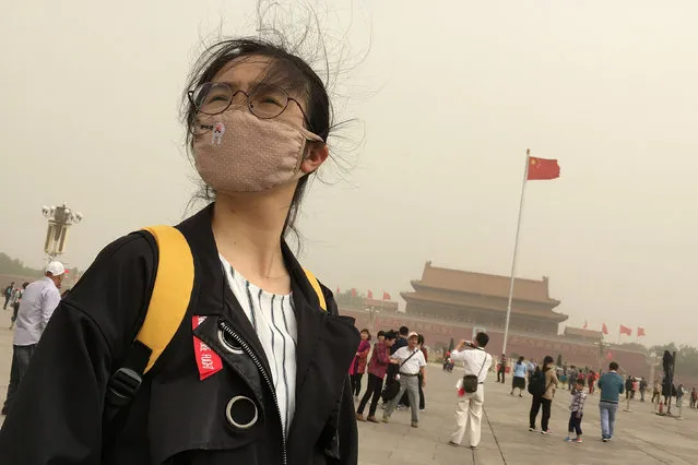 People visit Tiananmen Square as a dust storm hits Beijing, China May 4, 2017. (Photo by Jason Lee/Reuters)