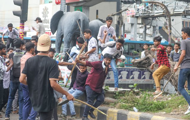 Quota protest attack an unidentified man during a clash with Bangladesh Chhatra League (BCL) activists in Dhaka, Bangladesh, 16 July 2024. Police report at least six people were killed and dozens injured on 16 July as clashes took place during nationwide protests demanding the abolition of quotas in government jobs. The students' protest continues under the “Anti-Discrimination Student Movement” banner. (Photo by Monirul Alam/EPA/EFE)