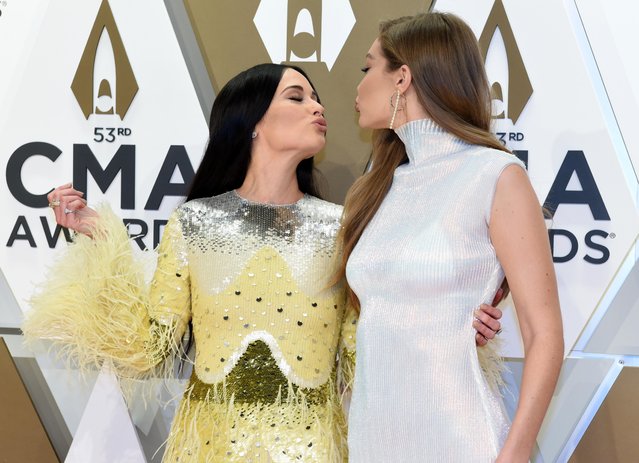 Kacey Musgraves and Gigi Hadid attend the 53nd annual CMA Awards at Bridgestone Arena on November 13, 2019 in Nashville, Tennessee. (Photo by Charles Pulliam/Reuters)
