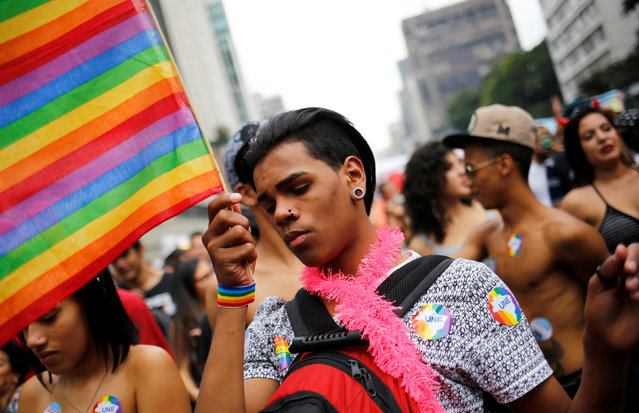 Revellers take part in the annual Gay Pride parade along Paulista Avenue in Sao Paulo, Brazil, May 29, 2016. (Photo by Nacho Doce/Reuters)