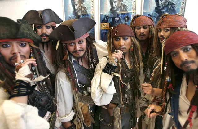 In this Tuesday, June 20, 2017 photo, Japan's Johnny Depp fans all dressed in Captain Jack Sparrow costumes pose before the Japan premiere of his film “Pirates of the Caribbean: Dead Men Tell No Tales” in Tokyo. (Photo by Shizuo Kambayashi/AP Photo)