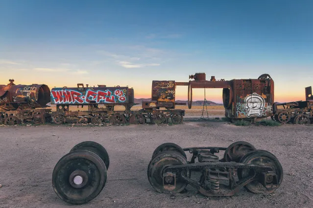 Nowadays, most of the locomotives and train cars have been stripped bare for scrap metal and parts, some vandalised and others turned into swings to provide a memorable photo op for passing tourists. (Photo by Chris Staring/Rex Features/Shutterstock)