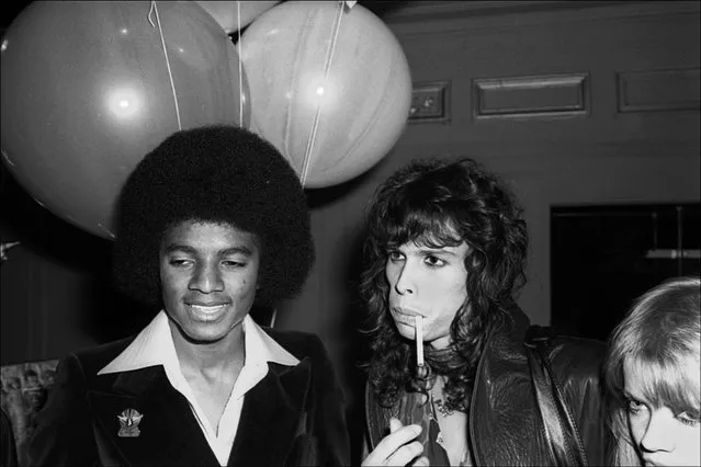 American musicians Michael Jackson, of the Jackson 5, and Steve Tyler, of the group Aerosmith, attend a Beatlemania party at Studio 54, New York, New York, June 9, 1977. (Photo by Allan Tannenbaum/Getty Images)