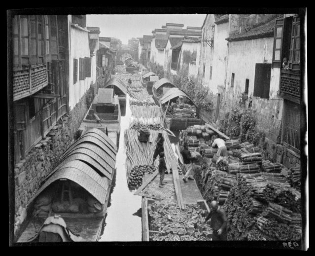 Wood Market and Canal. China, Hangzhou, 1917-1919. (Photo by Sidney David Gamble)