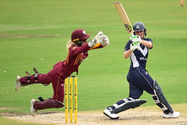 Georgia Redmayne of Queensland attempts to catch Sophie Reid of Victoria battiing during the WNCL match between Victoria and Queensland at CitiPower Centre, on February 07, 2025, in Melbourne, Australia. (Photo by Quinn Rooney/Getty Images)