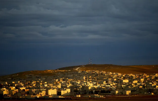 A general view of the Syrian town of Kobani is pictured from near the Mursitpinar border crossing, on the Turkish-Syrian border in the southeastern town of Suruc, October 19, 2014. (Photo by Kai Pfaffenbach/Reuters)