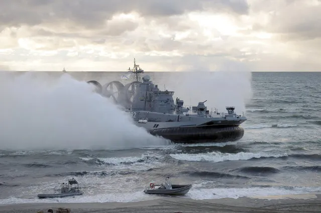 A military vessel is seen during the joint war games Zapad-2013 at the Khmelevka range on Russia's Baltic Sea in the Kaliningrad Region, September 26, 2013. (Photo by Alexei Druzhinin/Reuters/RIA Novosti/Kremlin)