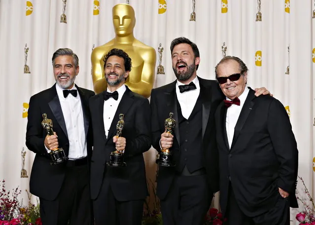 Best picture winner “Argo” producers George Clooney (L), Grant Heslov and Ben Afleck (2nd R) pose with their awards and presenter Jack Nicholson (R) at the 85th Academy Awards in Hollywood, California February 24, 2013. (Photo by Mike Blake/Reuters)