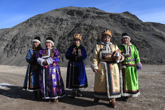 Local residents attend a celebration of Chaga Bairam, a New Year festival according to the Lunar calendar, in Saylyugemsky National Park, Kosh- Agach District, Altai Republic, Russia on February 21, 2018. (Photo by Kirill Kukhmar/TASS)