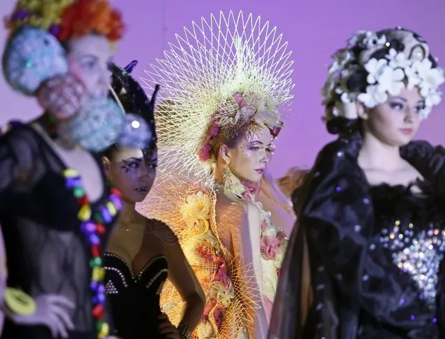 Models present costume designs and hairstyles during the 7th international festival of hairdressing art, fashion and design called “Crystal Angel” in Kiev, April 18, 2013. (Photo by Gleb Garanich/Reuters)