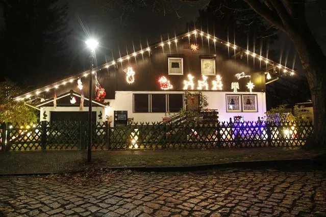A general view shows a so-called “Lichterhaus” (light house) with Christmas decorations and lights in Berlin, December 10, 2014. (Photo by Fabrizio Bensch/Reuters)
