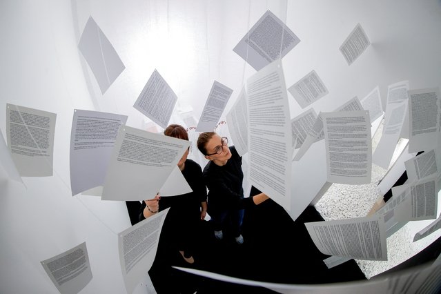 Visitors visit the newly opened Moment museum, which aims to commemorate the women and men who suffered sеxual misconduct during the 1998-99 war, in Pristina, Kosovo on December 6, 2024. Kosovo's authorities estimate around 20,000 individuals were subjected to rape during this period. (Photo by Valdrin Xhemaj/Reuters)