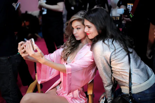 Model Gigi Hadid makes a selfie as she gets ready backstage before the Victoria's Secret Fashion Show at the Grand Palais in Paris, France, November 30, 2016. (Photo by Benoit Tessier/Reuters)