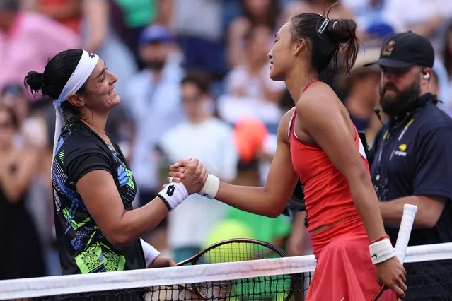 Ons Jabeur of Tunisia embraces Qinwen Zheng of China following their Women's Singles Fourth Round match on Day Eight of the 2023 US Open at the USTA Billie Jean King National Tennis Center on September 04, 2023 in the Flushing neighborhood of the Queens borough of New York City. (Photo by Clive Brunskill/Getty Images/AFP Photo)