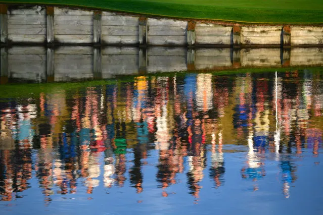 A reflection of spectators during the morning fourball matches of the 2018 Ryder Cup at Le Golf National on September 28, 2018 in Paris, France. (Photo by Stuart Franklin/Getty Images)