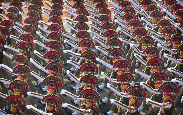 Indian paramilitary force soldiers march during the full dress rehearsal of the Republic Day parade, in New Delhi, India, Saturday, January 23, 2016. India celebrates Republic Day on Jan. 26 every year, highlighted by a march by different branches of the military as well as a display of arms and missiles. (Photo by Manish Swarup/AP Photo)