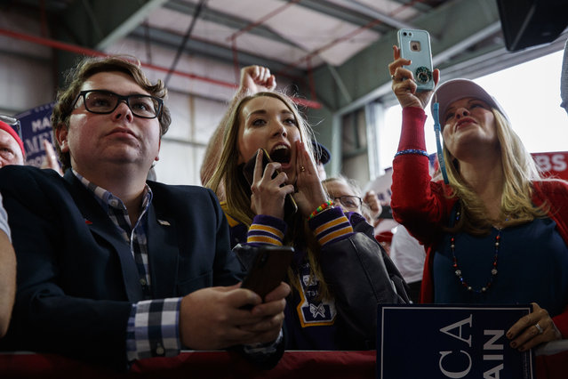 Supporters of President Donald Trump listen to him speak during a campaign rally, Sunday, November 4, 2018, in Macon, Ga. (Photo by Evan Vucci/AP Photo)