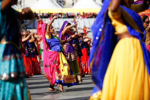 Dancers perform a mass Ghoomar dance during Diwali celebrations in Trafalgar Square, London, United Kingdom on November 7, 2018. (Photo by Henry Nicholls/Reuters)