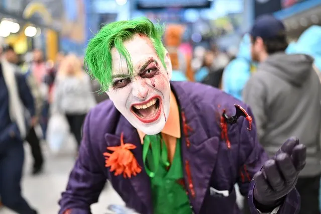 A cosplayer poses as Joker during New York Comic Con 2023 – Day 3 at Javits Center on October 14, 2023 in New York City. (Photo by Roy Rochlin/Getty Images for ReedPop)