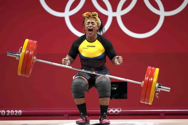 Tamara Yajaira Salazar Arce of Ecuador reacts after a successful lift, in the women's 87kg weightlifting event at the 2020 Summer Olympics, Monday, August 2, 2021, in Tokyo, Japan. (Photo by Luca Bruno/AP Photo)