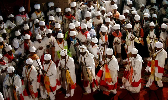 Ethiopian Orthodox choir members perform during the Ethiopian Christmas Eve celebration in Bete Maryam (House of Mary) monolithic church in Lalibela, Ethiopia January 6, 2017. Picture taken January 6, 2017. (Photo by Tiksa Negeri/Reuters)