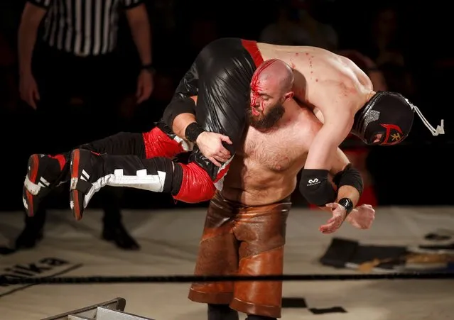 Wrestler Dover (L) fights against Nitro during the Hungarian wrestling Championship in Budapest, Hungary February 13, 2016. (Photo by Laszlo Balogh/Reuters)