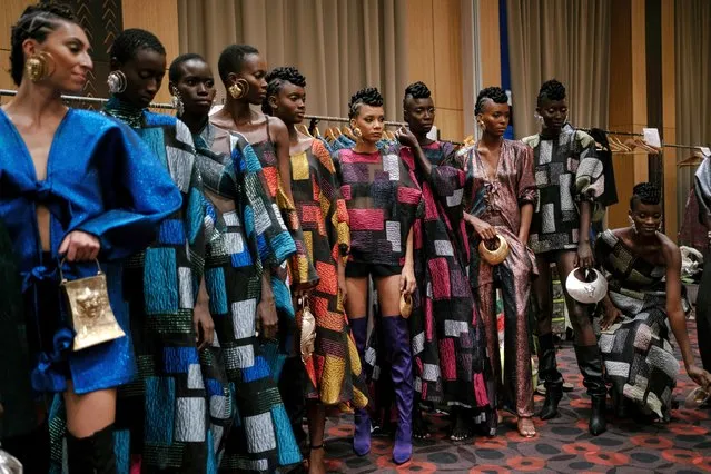 Models line up backstage ahead of Dakar fashion week at AzalaÔ Hotel in Dakar, Senegal, on December 9, 2023. (Photo by Carmen Abd Ali/AFP Photo)