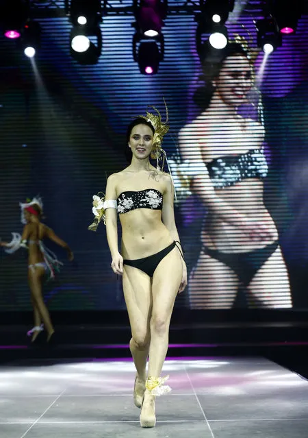 A model presents a creation by Italian brand name Totti Swimwear during “Moda Italia Minsk” event in Minsk, March 3, 2016. (Photo by Vasily Fedosenko/Reuters)