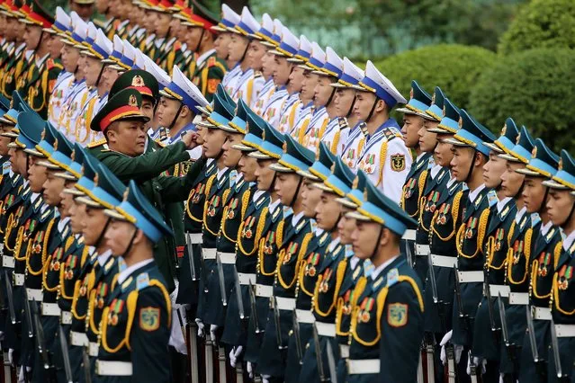 Members of the honor guard prepare ahead the welcome ceremony of German president at the Presidential Palace in Hanoi, Vietnam, 23 January 2024. Steinmeier is on an official visit to Vietnam from 23 to 24 January 2024. (Photo by Luong Thai Linh/EPA)