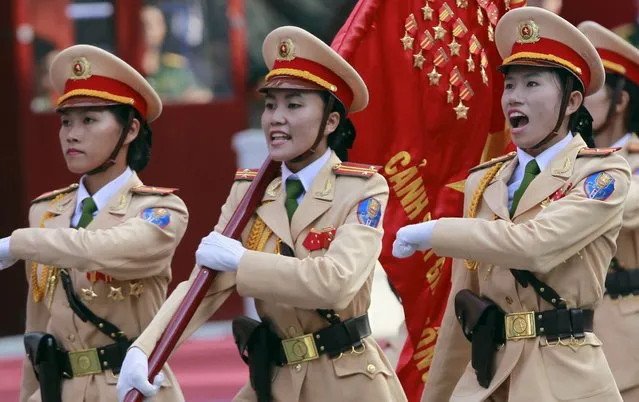 Vietnamese female traffic police officers march during a rehearsal for a military parade as part of the 40th anniversary of the fall of Saigon in southern Ho Chi Minh City (formerly Saigon City), Vietnam, on April 26, 2015. (Photo by Reuters/Kham)